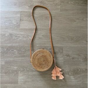 Tan circular straw purse